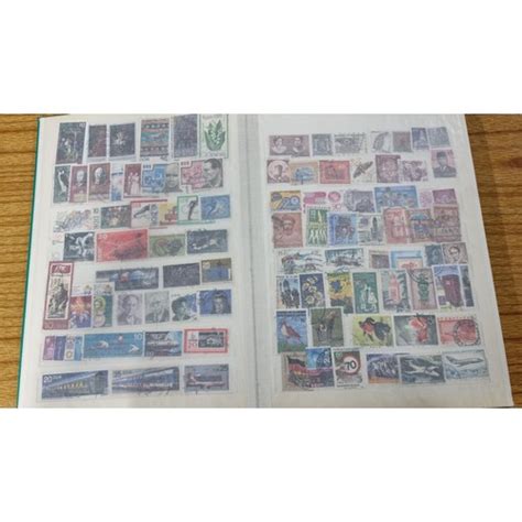 Green Comprehensive Stamp Album With A Large Quantity Of British Stamps