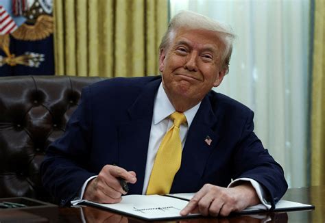 With Kid Rock at his side, Trump signs executive order targeting ticket