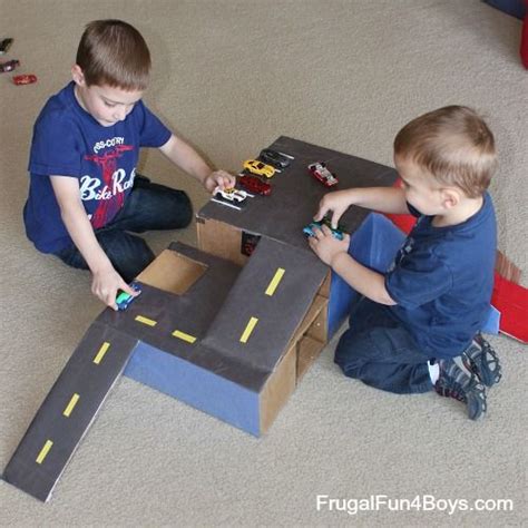 Cardboard Box Garage For Hot Wheels Cars Cardboard Car Cardboard Box Crafts Cardboard Race