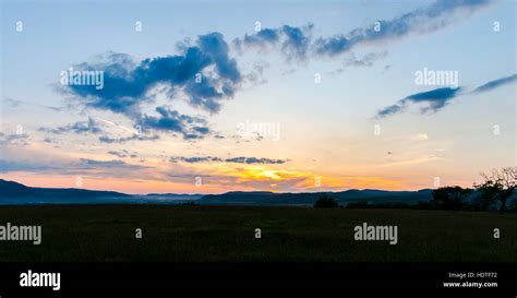 Amazing clouds at the sunset Stock Photo - Alamy