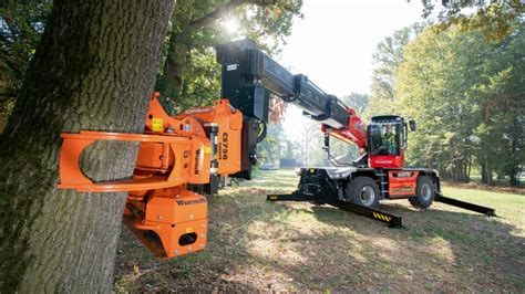 Manitou Pairs Grapple Equipped Tree Saw With Rotating Telehandlers For