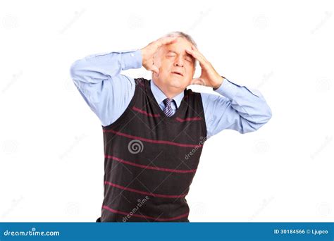 A Mature Man Holding His Head In Pain Stock Photo Image Of Posing