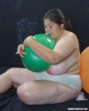 Pretty Bbw Chick Naked And Smoking While Sitting On Balloons Photos