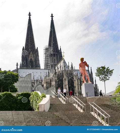 Adam from Michelangelo in Pink is Standing in Front of the Cologne Dome