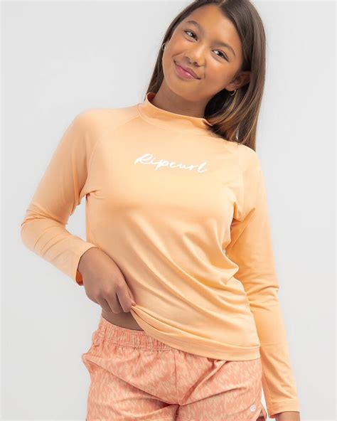 Shop Rip Curl Girls Script Long Sleeve Rash Vest In Peach Fast Shipping And Easy Returns City