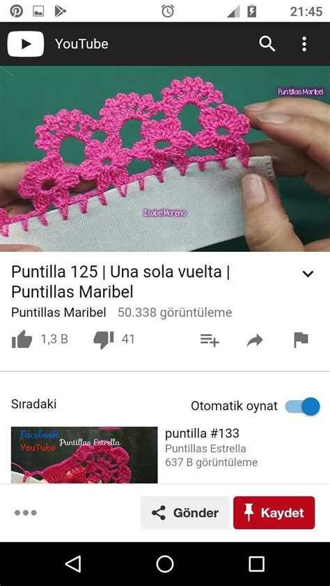 The App Is Showing How To Crochet With Pink Thread And Buttons On It