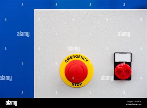 Red Emergency Stop Button For Stopping A Machine In Emergency Situation