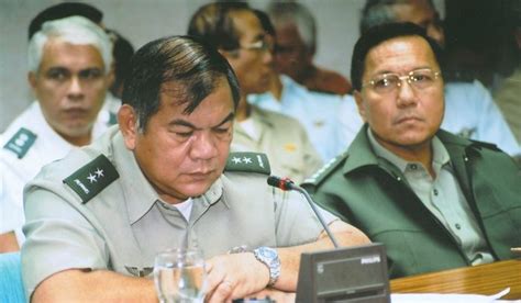 gen garcias wife  sons remain charged  plunder money