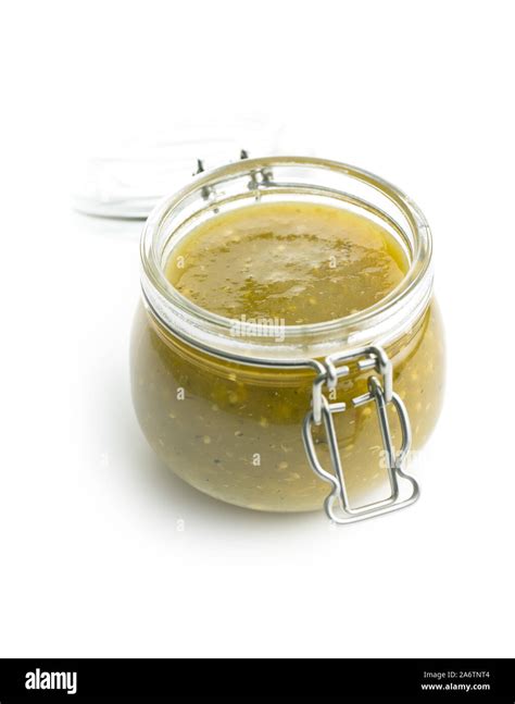 Hot Jalapeno Sauce Green Chilli Sauce In Jar Isolated On White Background Stock Photo Alamy