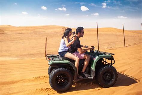 Dubai Woestijnsafari Quad Rijden Kamelenrit En Sandboarden