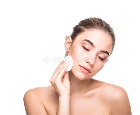 Beautiful Natural Brunette Girl Cleaning Face With Cotton Sponge Smiling Looking At Camera Over