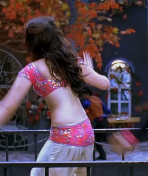 Tamanna Karthi Siruthai Rakamma 17 Hot Backless Hd Caps Indiancelebblog