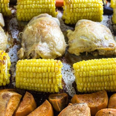 Sheet Pan Crispy Baked Chicken Thighs And Vegetables • Dishing Delish