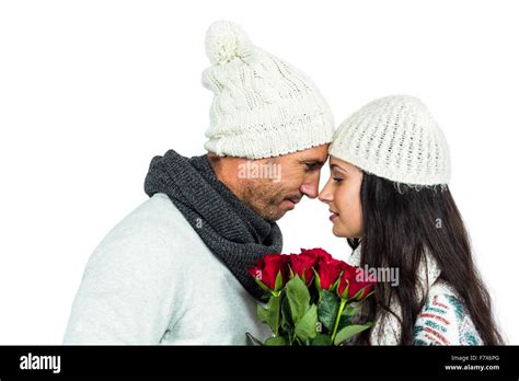 Smiling Couple Nose To Nose Holding Roses Bouquet Stock Photo Alamy