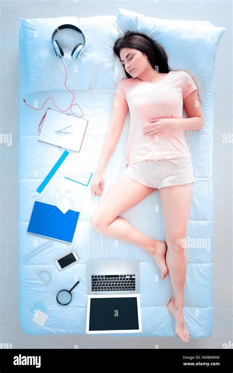 Delighted Brunette Sleeping On Her Bed Stock Photo Alamy