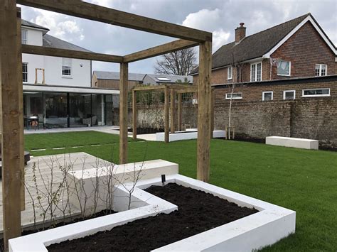 Timber Cube Structures White Rendered Raised Beds And Raised Decking