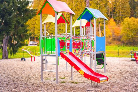 Premium Photo Colorful Playground On Yard In The Park Colorful