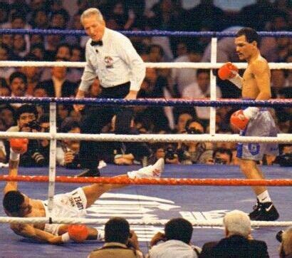 Rosendo Alvarez knocks down Ricardo Lopez during their first fight ...