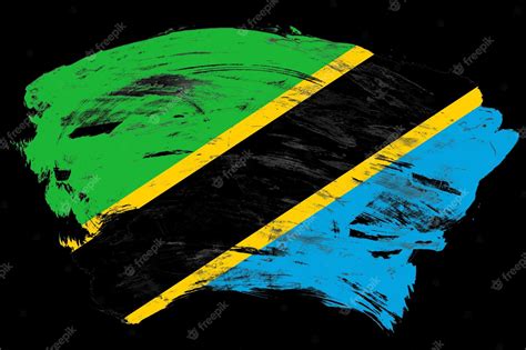 Premium Photo Tanzania Flag On Distressed Black Stroke Brush Background