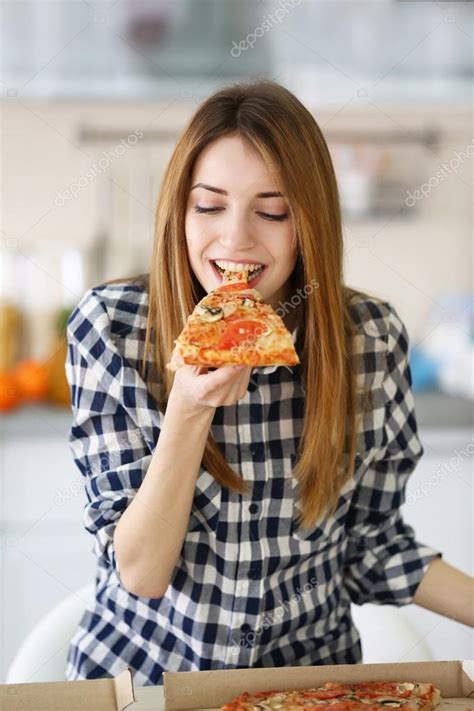 Woman Eating Hot Pizza Stock Photo By Belchonock 107755518