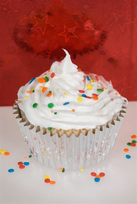 Cupcake With White Frosting And Sprinkles Stock Image Image Of White