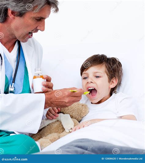 Child Taking Cough Medicine Stock Photo - Image of cough, doctor: 12808620