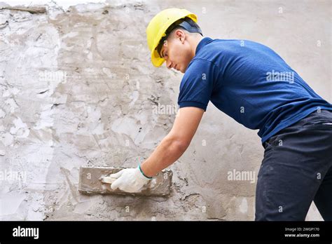 Male Labor Plastering Wall With Concrete Stock Photo Alamy