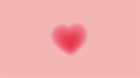 A Red Heart On A Pink Background