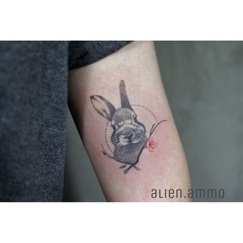 Black and white rabbit tattoo with dot work style tattoo, realistic ...