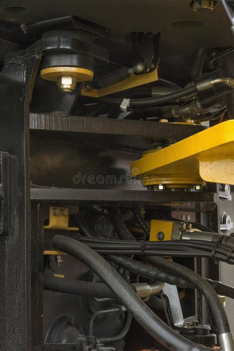 The Rotation Mechanism And The Hydraulic Lines Of The Tractor Stock