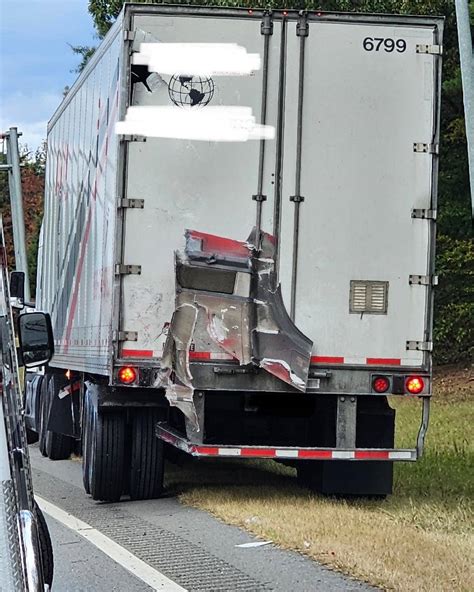 Semi Truck Driver Walks Away From Crash That Obliterated Their Truck Cab