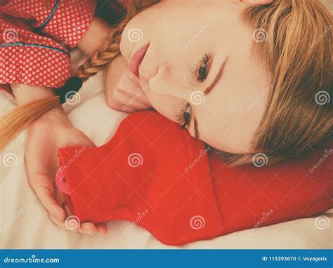 Woman Sleeping With Warm Red Hot Water Bottle Stock Photo Image Of Bottle Pain