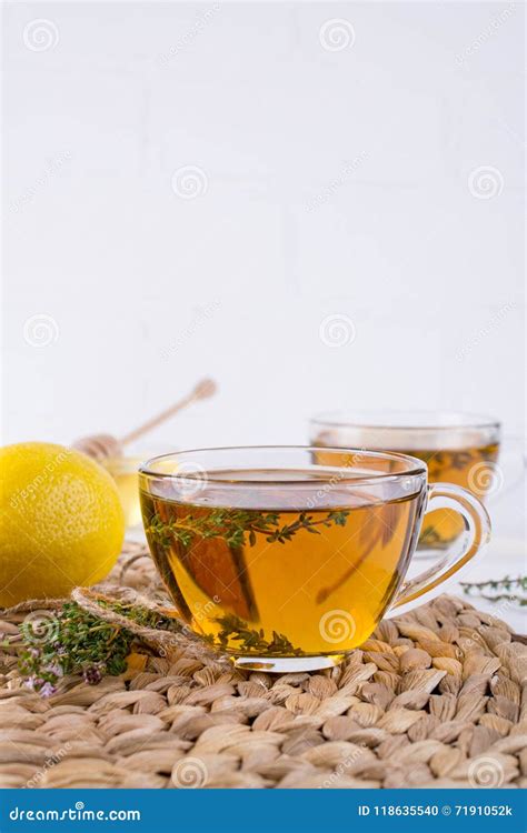 Glass Cup Of Hot Aromatic Herbal Tea With Bunch Of Fresh Wild Thyme Stock Photo Image Of