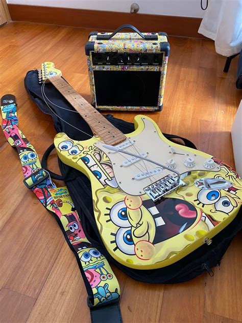 Limited Edition Spongebob Electric Guitar With Spongebob Strap And Amplifier Hobbies And Toys