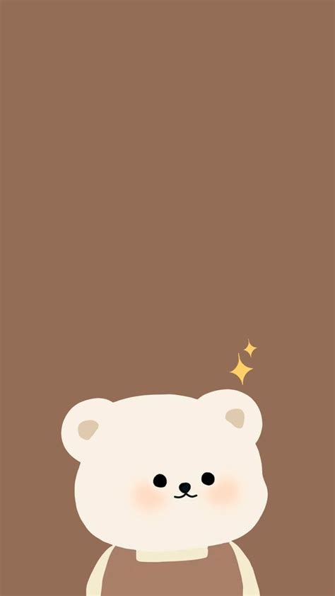 A White Teddy Bear With A Brown Shirt And Stars On It S Chest In Front