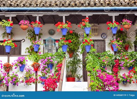 Typical Terrace Balcony Decorated Pink And Red Flowers Spain