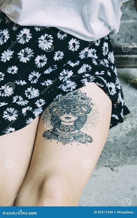 Woman with Tattoo on Her Leg Stock Image - Image of adult, casual: 92311549