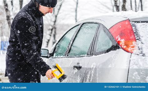 Man Cleans His Car From The Snow Stock Image Image Of Nature