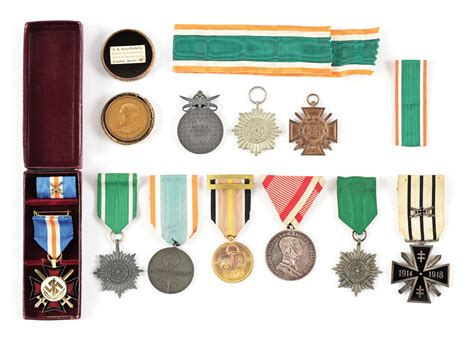 Lot Detail - LOT OF GERMAN WWII MEDALS AND AWARDS.