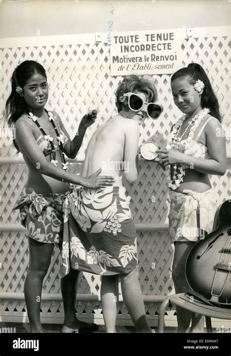 Jun. 06, 1967 - Tahiti girls show how to get tanned within hours using ...