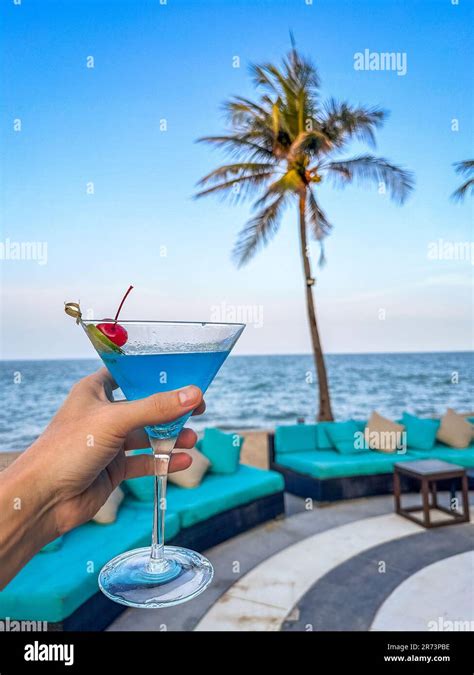 Two Cocktails Blue And Orange At A Beach Bar In Hua Hin Thailand Stock