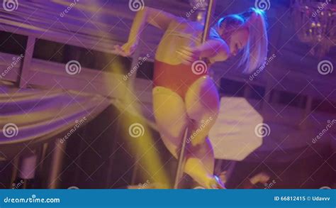 Go Go Dancer In Bikini On Pole On Stage Of Nightclub Slow Motion Strip Plasty Stock Video