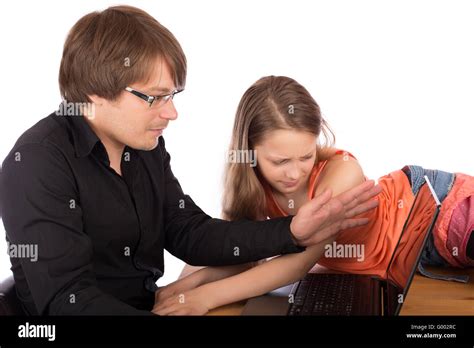 Dad Hides His Strength - Dad hides laptop to his daughter Stock Photo - Alamy