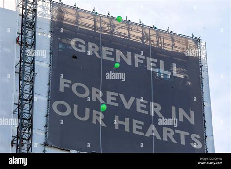 A memorial service is held at Grenfell Tower to commemorate the 5th ...