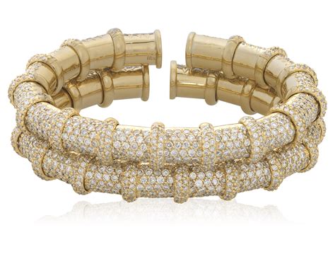 PAIR OF DIAMOND AND GOLD CUFF BRACELETS, | Christie’s