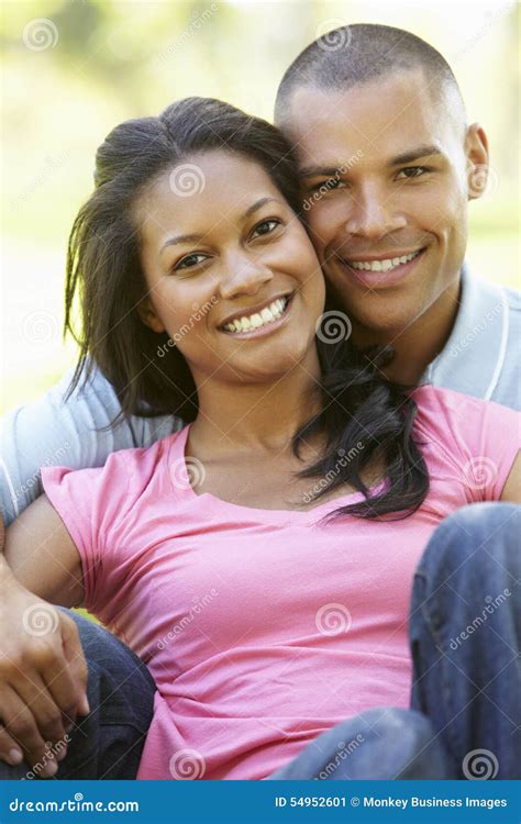 Portrait Of Romantic Young African American Couple In Park Stock Image