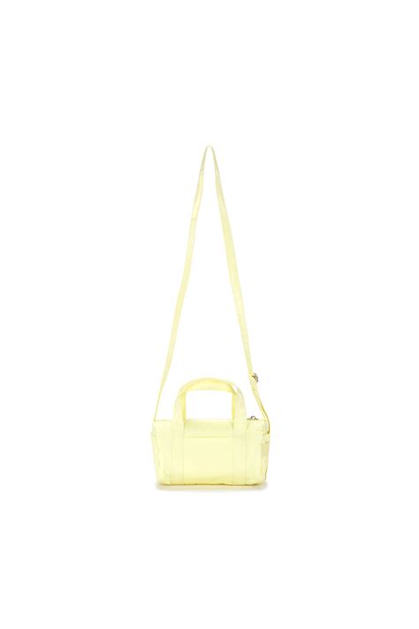 GLOSSY LOGO SPORTY MINI DUFFEL BAG IN LIGHT YELLOW MATINKIM