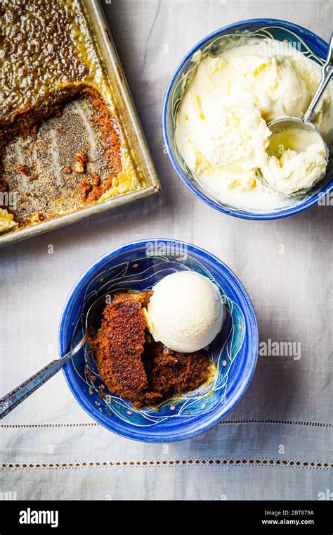 Sticky Toffee Pudding with Vanilla Ice Cream Stock Photo - Alamy