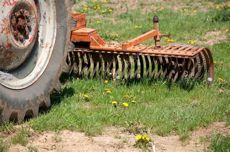 Old farm tractor plow — Stock Photo © cfarmer #5565900