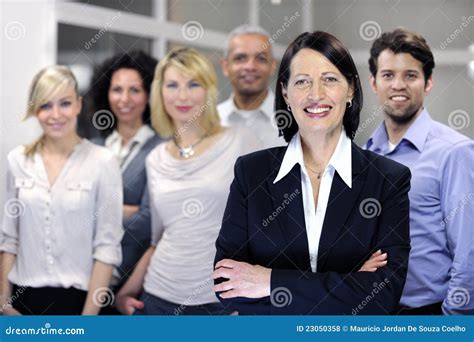 Mature Businesswoman And Business Team Stock Photo Image Of Executive